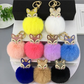 

New pearls rhinestones Animal head hair ball key ring pendant women's bag accessories home delivery