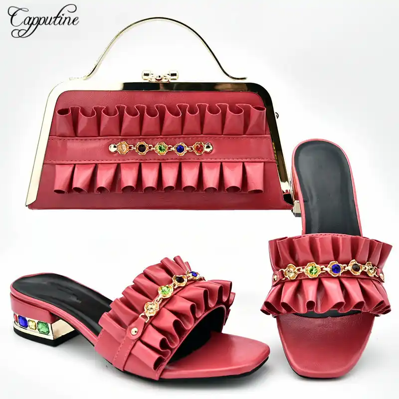 coral clutch bag and shoes