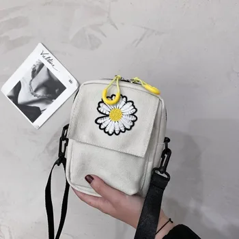 

Canvas bag female Korean white canvas small square bag shoulder bag embroidered small daisy messenger bag female
