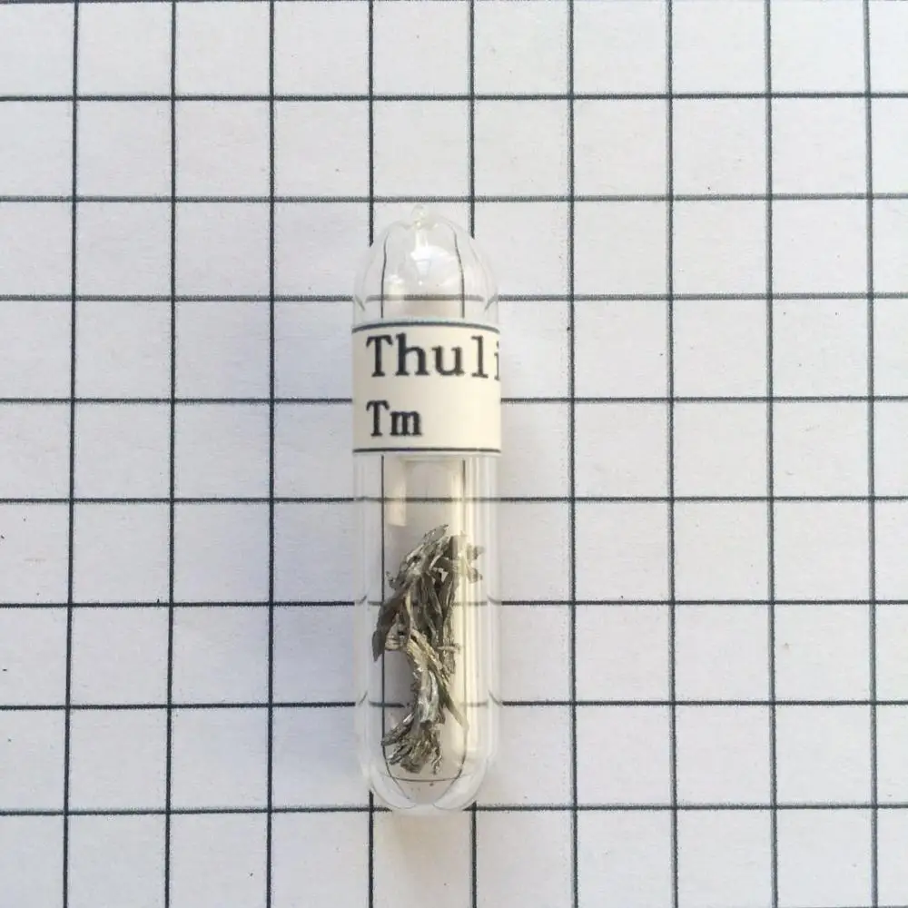 1 г-99.99% Thulium металл, Tm элемент 69 образец, стружка в стеклянной ампуле