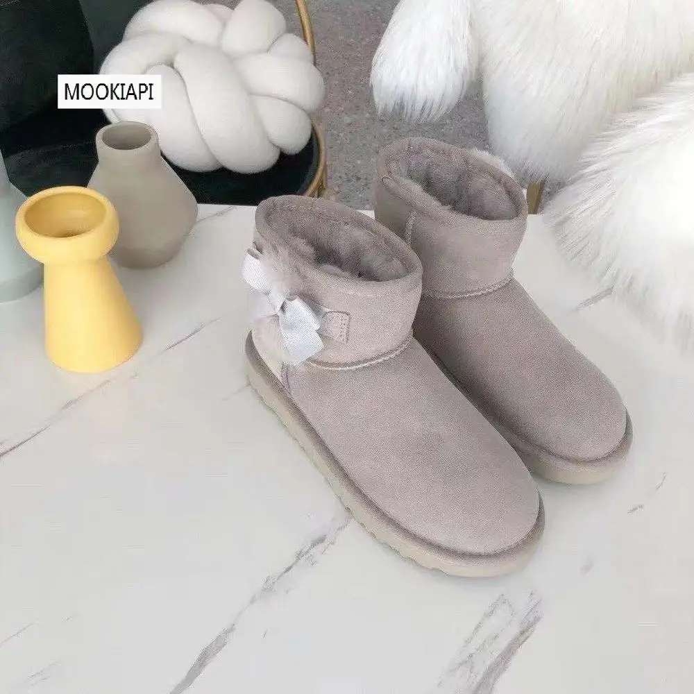 Australia's latest women's snow boots with wool ball, real sheepskin, natural wool, free delivery of high-quality shoes