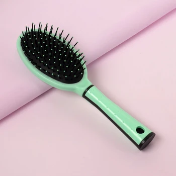 

Massage hairbrush, color turquoise