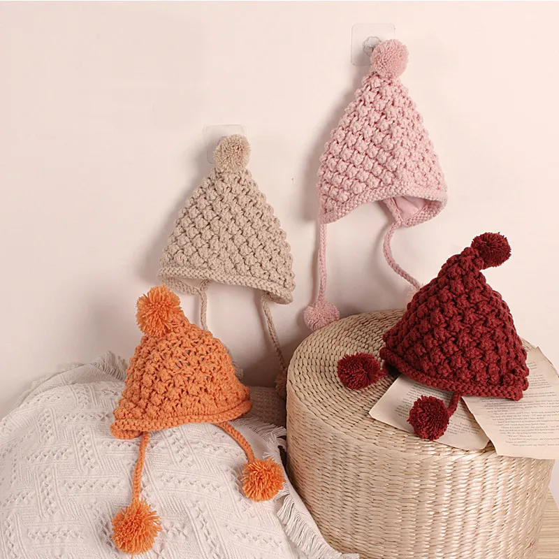 

Baby Kids Windproof Woolen Knitted Cap Earmuffs Hats Casual Cute Pom pom Solid Knitwear Caps for Girls Boys 1-4Y Autumn Winter
