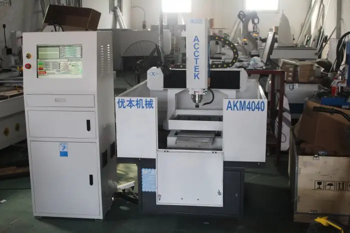 Jinan AccTek factory directly supply semi-closed heavy duty structure mini cnc router engraving/cutting machine AKM4040H
