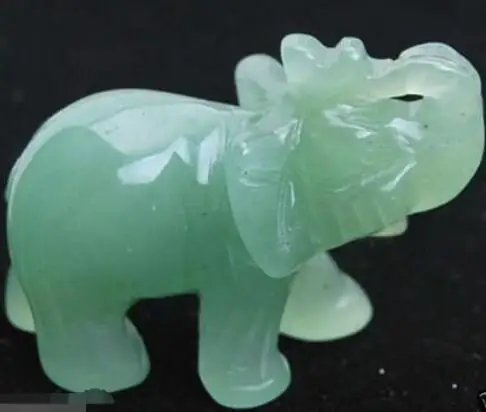 

INTERESTING GREEN JADE CARVED ELEPHANT SMALL STATUE