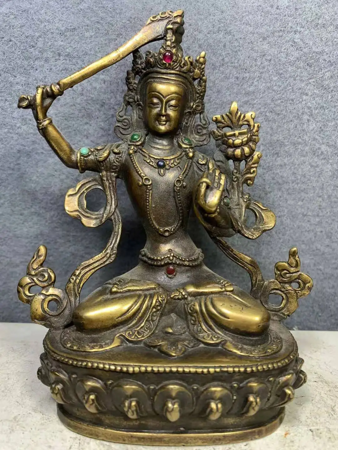 

Rare old Antique Tibet copper Inlaid gems sky king buddha statue