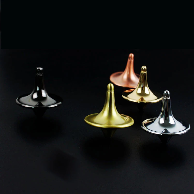 silver spinning top
