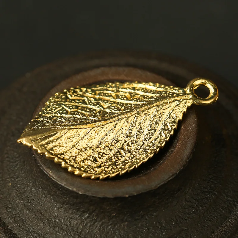 gold leaf charms (3)
