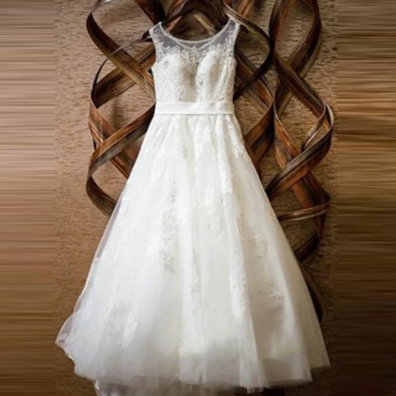 

Wholesale Gorgeous A Line Lace Cap Sleeve Bridal Wedding Dresses Illusion Jewel Neck Wedding Gowns for Bride Appliqued Beads