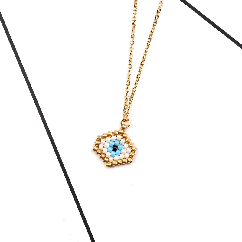 

FAIRYWOO gold eye blue Necklace