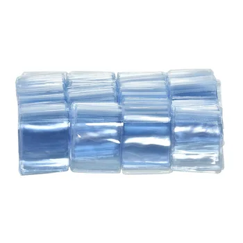 

100Pcs 70 X 50 Mm Clear PVC Plastic Coin Bag Case Wallets Storage Envelopes New Packaging On Sale