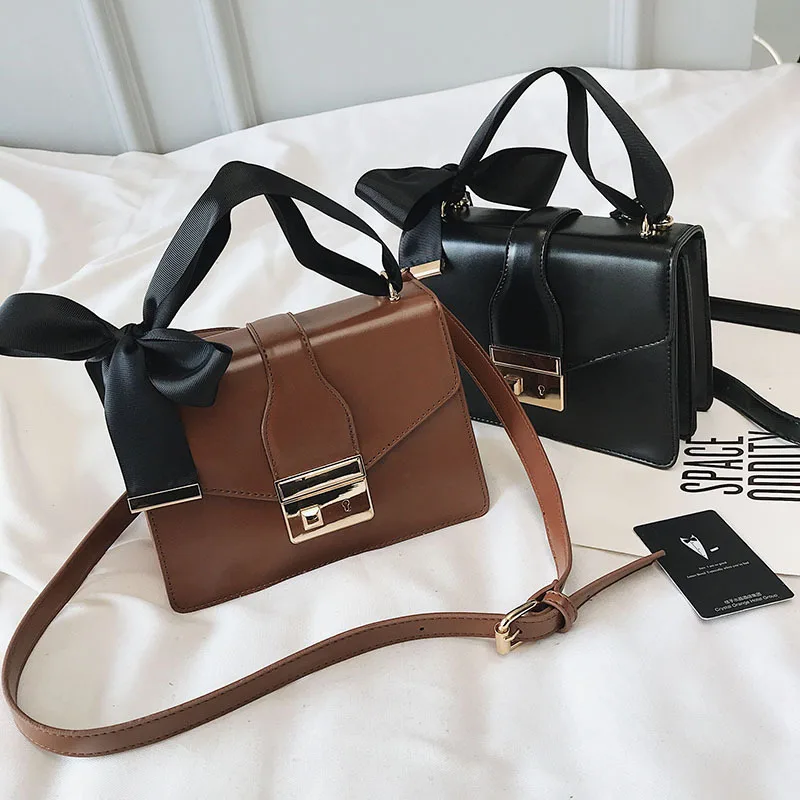 

2019 new socialite wind bow knot small square bag lock buckle one shoulder slanted girl bag