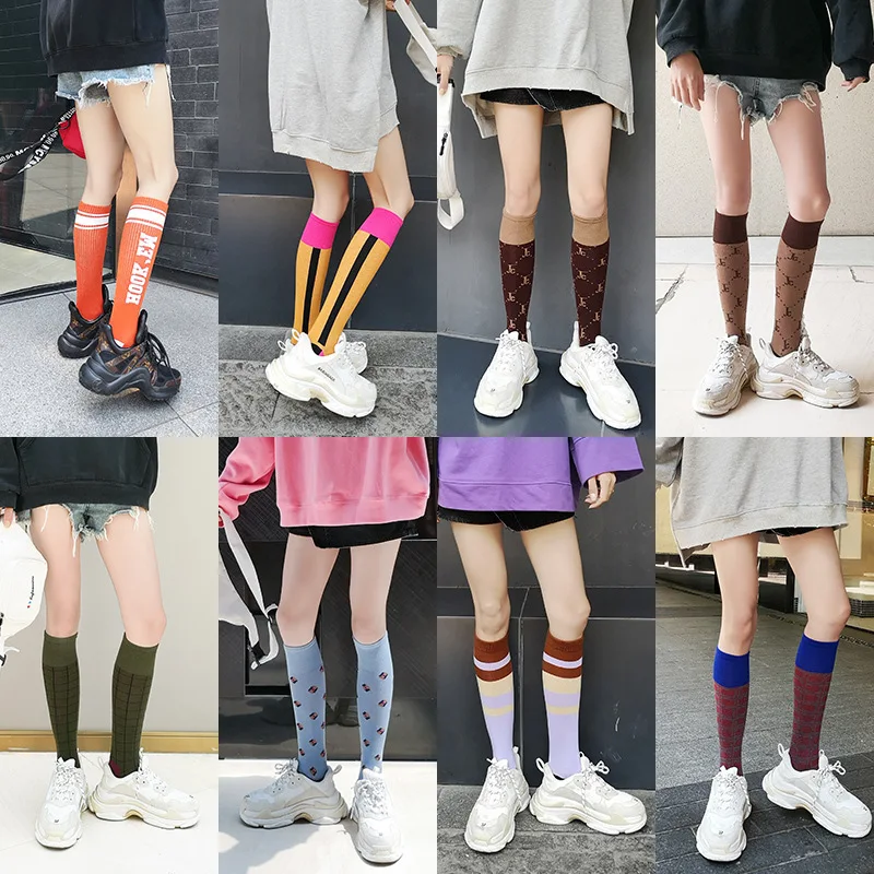 

The new trend of the same paragraph network red calf socks color matching color houndstooth female knee socks high tube long socks fashion pile socks