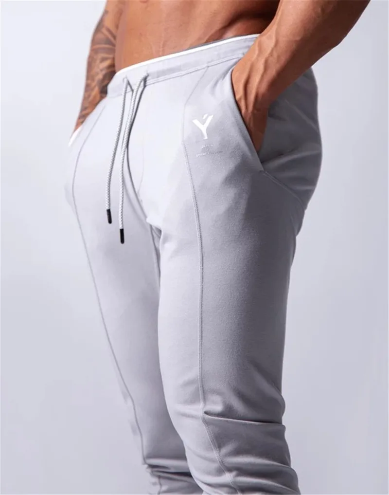 New Jogging Pants Men Sport Sweatpants Running Pants GYM Pants Men Joggers Cotton Trackpants Slim Fit Pants Bodybuilding Trouser black sweatpants