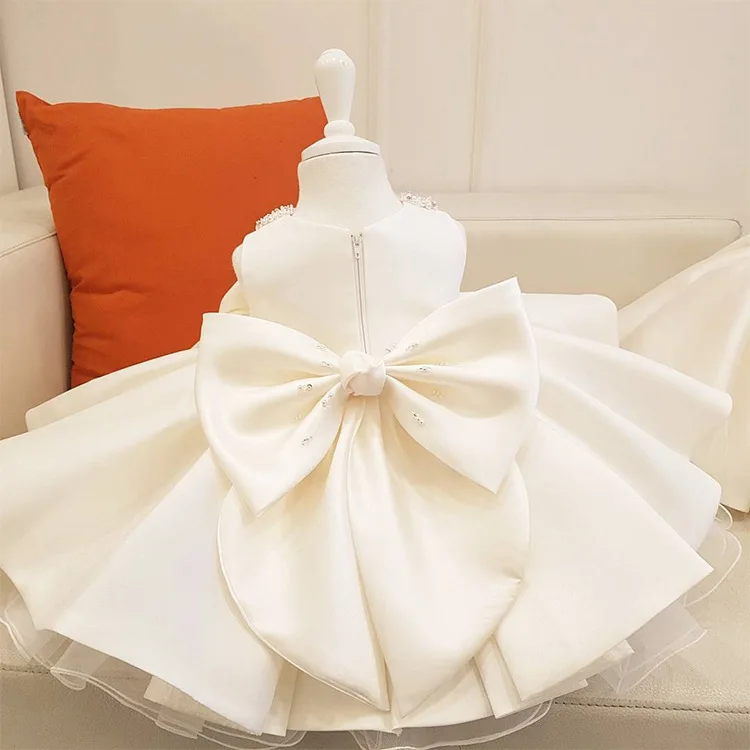 Детское платье без рукавов белое для крещения с бантом| |