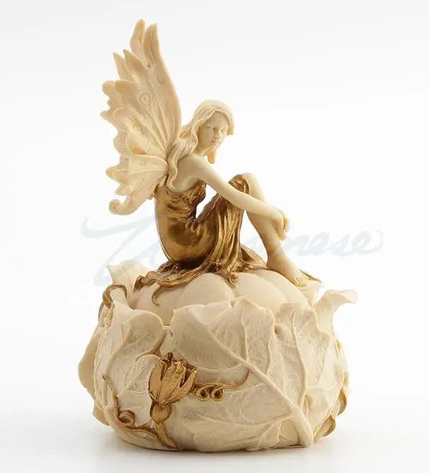 

Velroni creative jewelry box fairy sitting hands on legs ivory white book gold birthday present