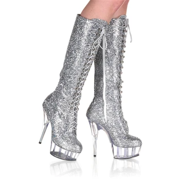 

Silver glitter sequined boots 15cm high heel shoes with super thin heel straps round toe in front of the waterproof table