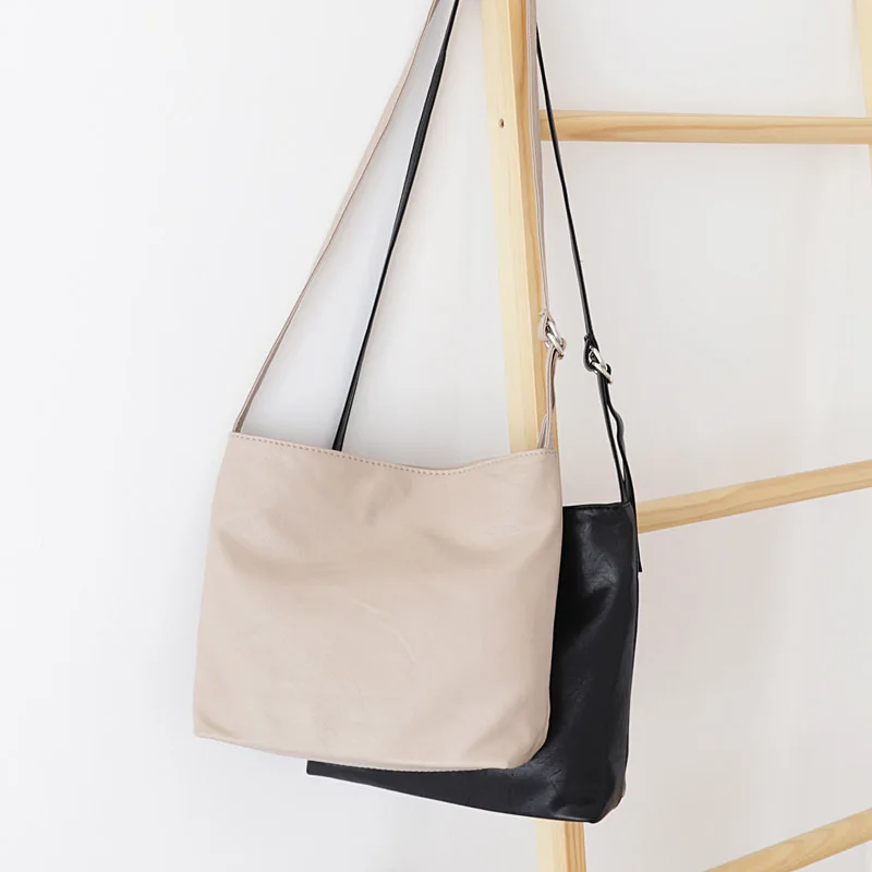 

Korean version of the niche retro bucket bag college style candy color Messenger bag simple casual student shoulder bag