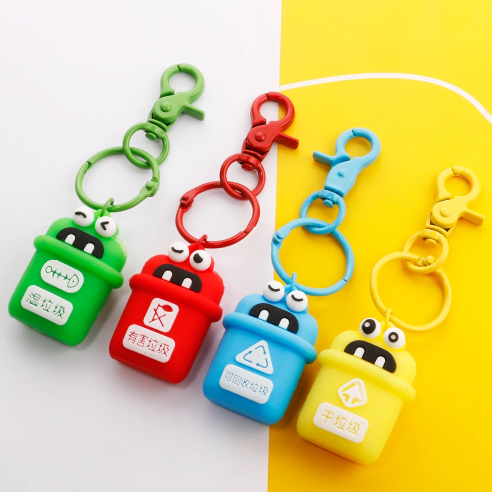 

New Arrival Cute Child Environment PVC Dustbin Molding Keychain Bag Car Pendant Anime Keychain Cute Cartoon Garbage Keychain