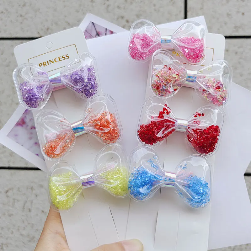 

2pcs South Korean children's colorful quicksand hairpin bow star transparent hairpin clip girl girl children's hair accessories