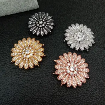 

Cubic Zircon Micro Flower clasp 30mm golden plated 3 strands