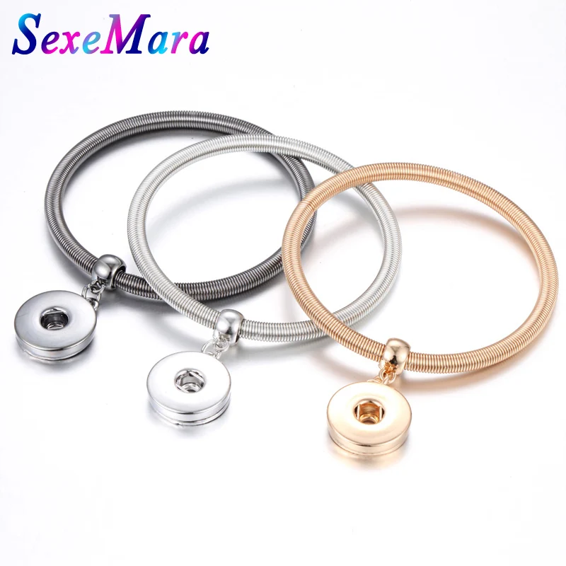 Женский эластичный браслет с защелками золотистый и серебристый цвета 18 мм