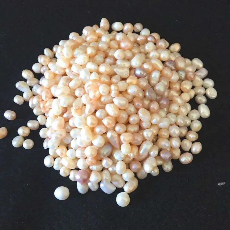 

Manufacturers Direct Selling Glare Virgine Natural Breeding Fresh Water Loose Pearl Rice Shape Non-Porous luo zhu Beige Pearl