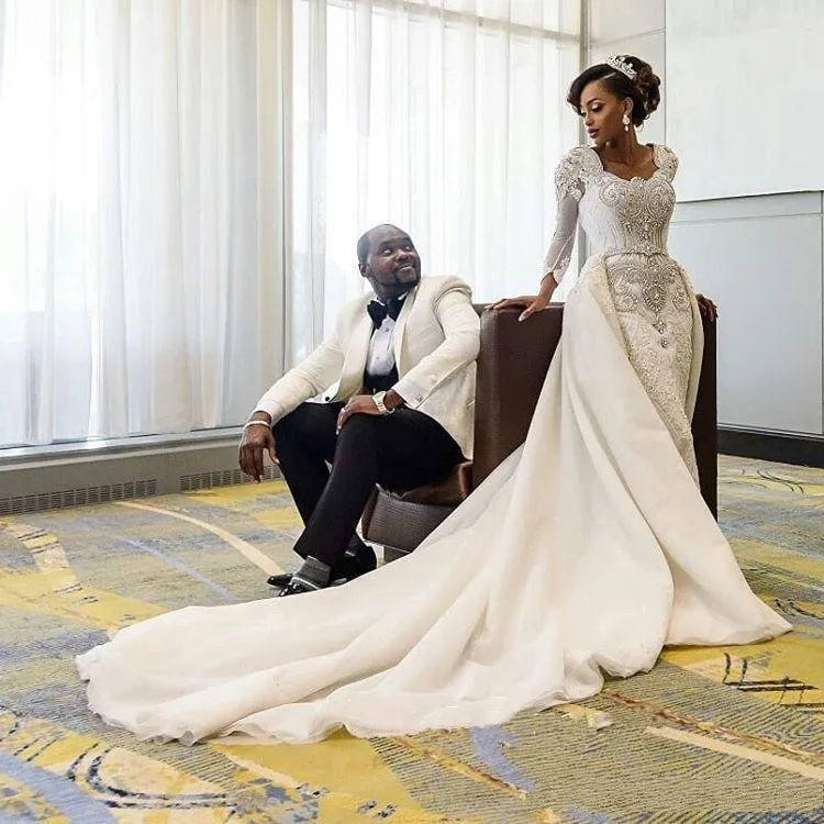 2019 African Long Sleeves Lace Mermaid Wedding Dresses Scoop Neck Lace Applique Beaded Crystals Over Skirts Court Train Wedding Bridal