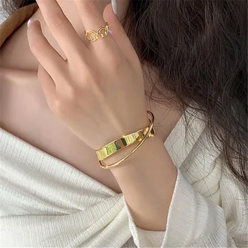 

South Korea's new shiny double-layer geometrical irregular cross polishing lady bracelet jewelry Metal retro women's bracelets