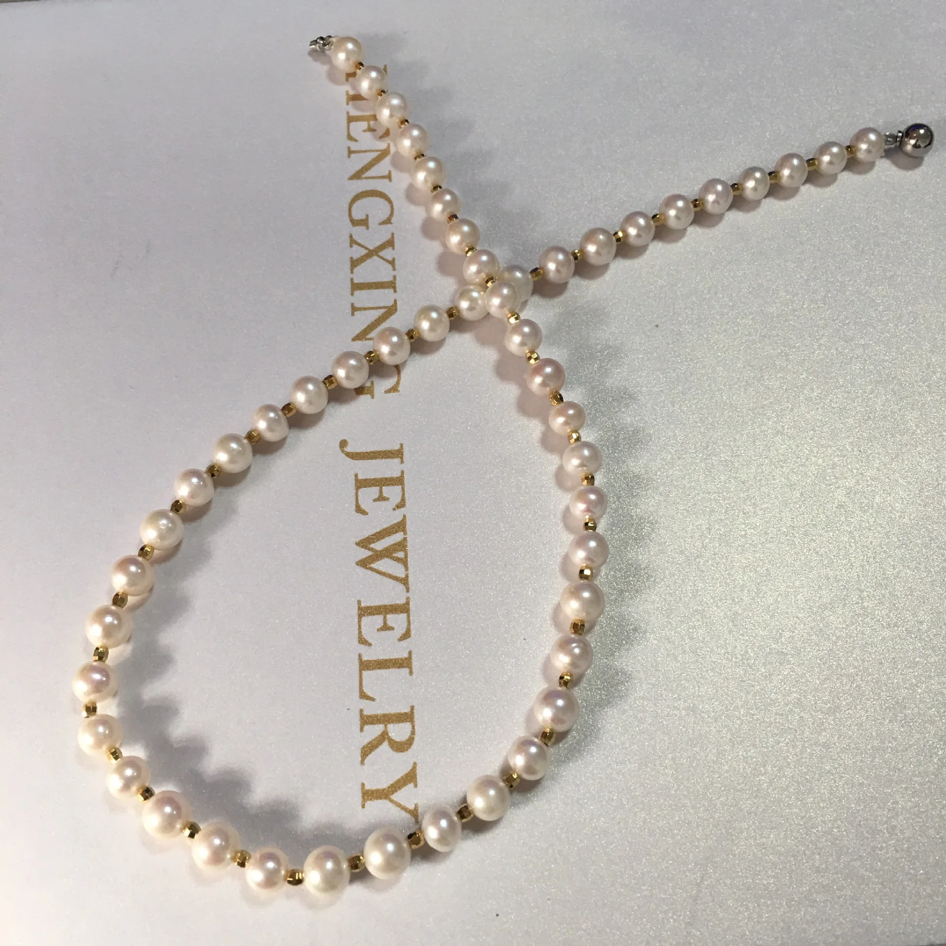 

Hengxing Freshwater near round Pearl Necklace Interval Ball Collocation Cool Fashion 6-7 near round Pearl Glare