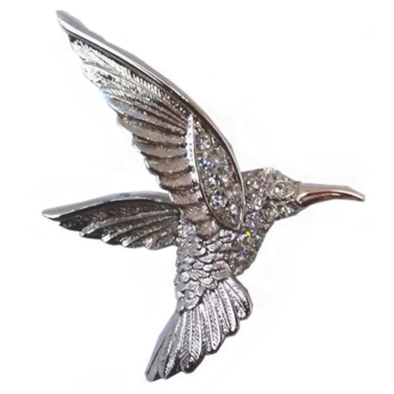 Винтажная брошь серебристого цвета с кристаллами летающая птица женская на