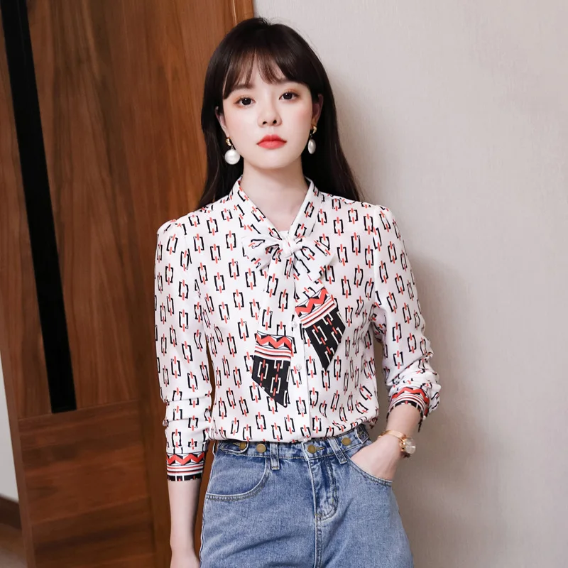 

Autumn 2020 new floral shirt women's design sense small number of light cooked shirt fashion foreign style bow Chiffon Top