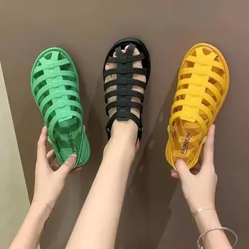 

Hole female sandals summer candy color non-slip plastic cross belt beach shoes seaside flat jelly shoes