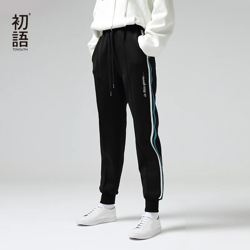 Женские брюки-шаровары в полоску с талией на шнурке | Женская одежда