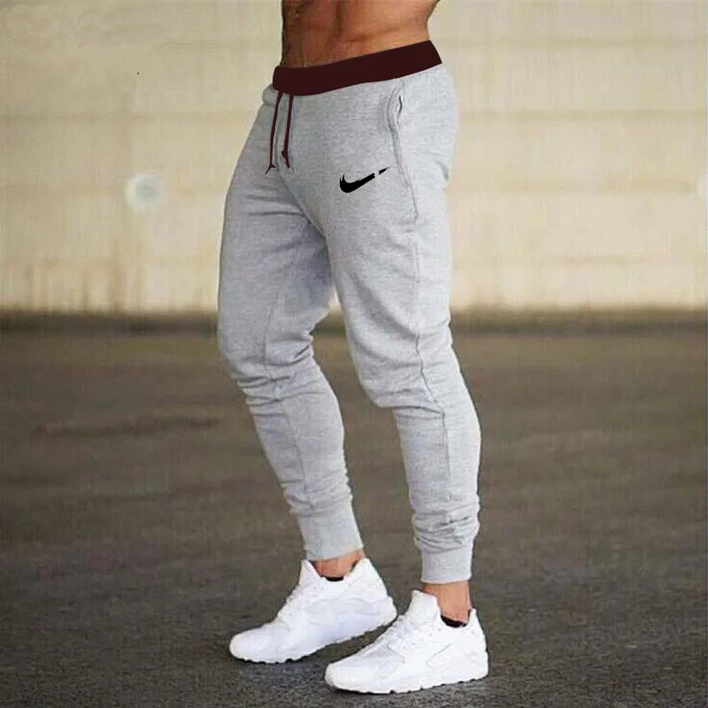 

2019 New casual men's pants cotton autumn printing men's jogging sports pants trousers GYMS Fitness jogger stretch pants men