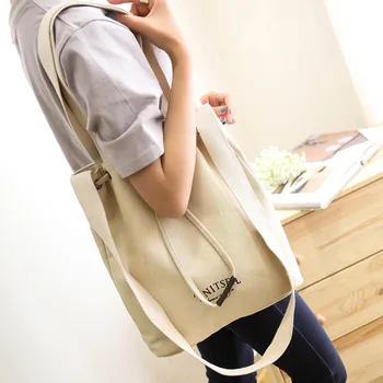 

Descendants of the Sun Celebrity Style Women’s Canvas Handbag New Style Simple Lettered Pull-belt Bucket Crossbody Bag