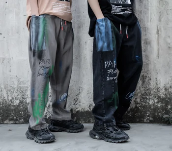 

Harajuku Graffiti Pockets Jeans Pants Men Streetwear Loose Drawstring Denim Trousers Hip Hop Ripped Plus Size Baggy Track Pants