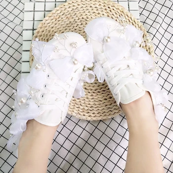 

2020 autumn new Korean hand-sewn pearl crystal flowers casual shoes student white shoes women canvas shoes