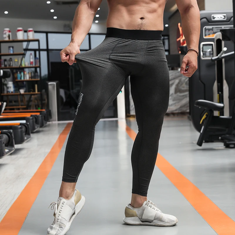 Desgaste de los hombres de compresión Medias Leggings Baloncesto Gym  Fitness Ropa de deporte para hombre que funciona con pantalones de  entrenamiento