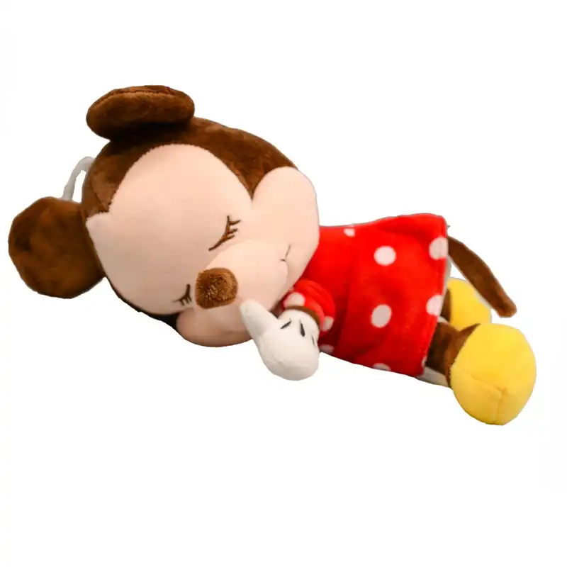 baby sleeping with stuffed animal