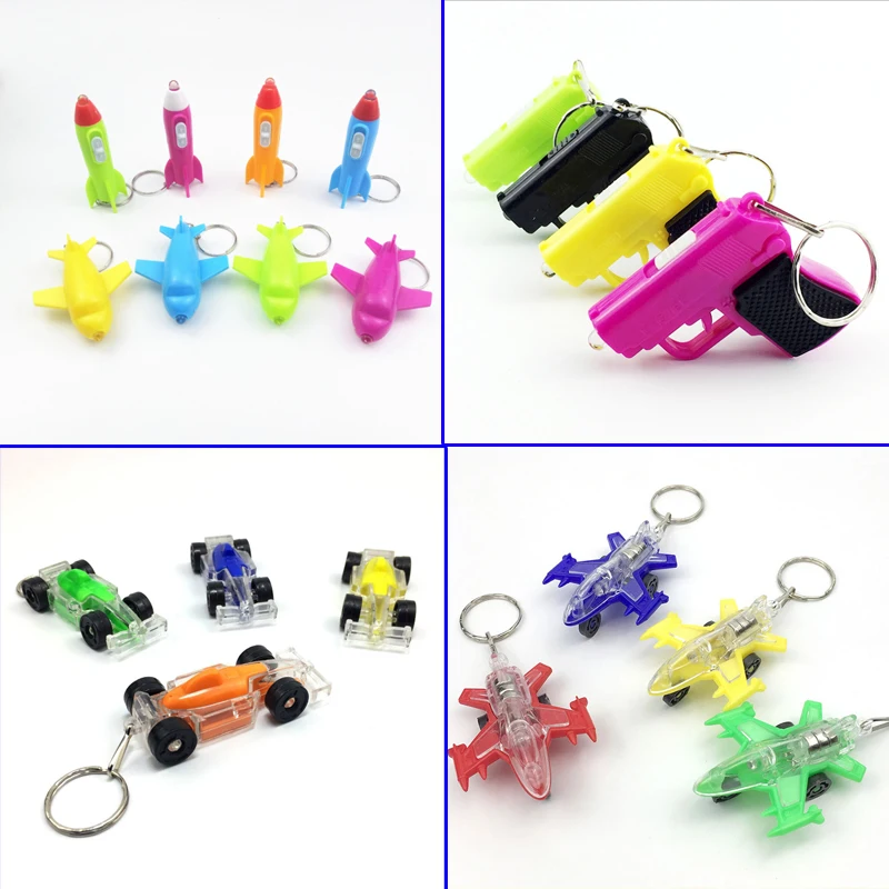 

100pcs/Lot LED Gun Keychain Flashing Car Key Chain Transparent Rocket Keyring Toy Plane Key Ring