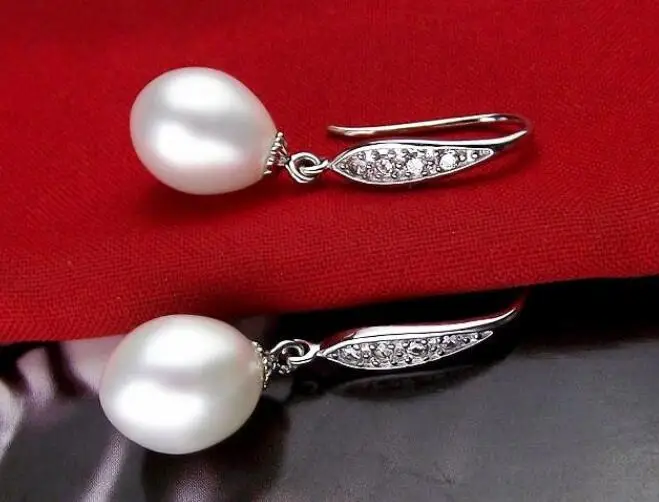 charming pair of south sea 11-12mm round white pearl earring925s