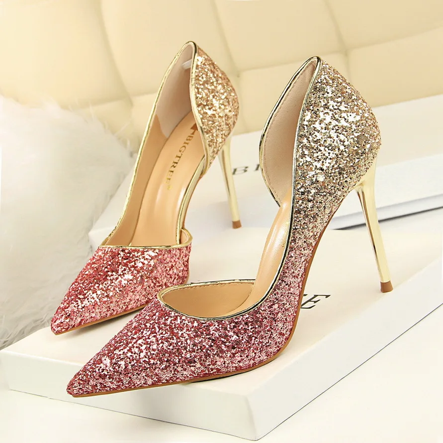 

European and American high-heeled shallow mouth pointed sexy nightclub slim sequin side hollow single shoes