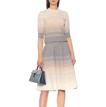 

2019 autumn and winter new Gradual Color Short-sleeved Round-neck Top sweater + Elastic Woolen skirt Suit