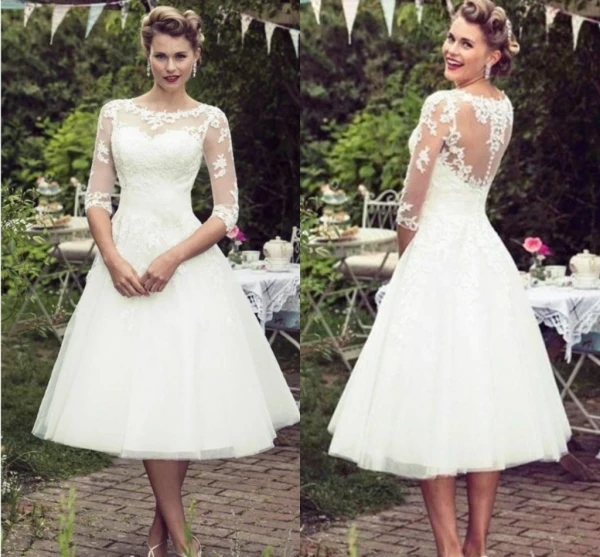 Vintage 50's Stijl Korte Kant Trouwjurken Half Mouwen Tule Kant Applique Thee Lengte Bridal Bruidsjurken Met Knoppen Vintage 50's Stijl Korte Kant Trouwjurken Half Mouwen Tule Kant Applique Thee Lengte Bridal Bruidsjurken Met Knoppen