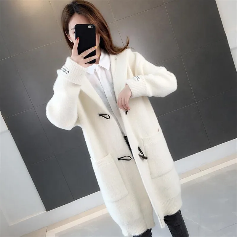 

Autumn 2019 new imitation water jacket jacket female long section horn buckle solid color long sleeve ladies sweater knit