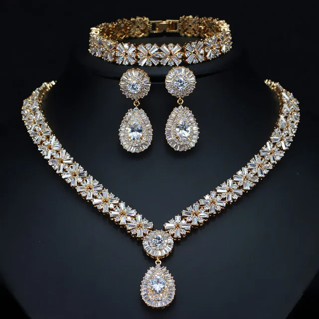 Buy OnlineCWWZircons Exclusive Dubai Gold Plate Jewellery Luxury Cubic Zirconia Necklace Earring Bracelet Party Jewelry Set for Women.