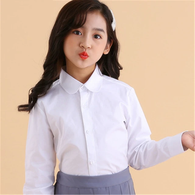 Camisa blanca de manga larga para niña