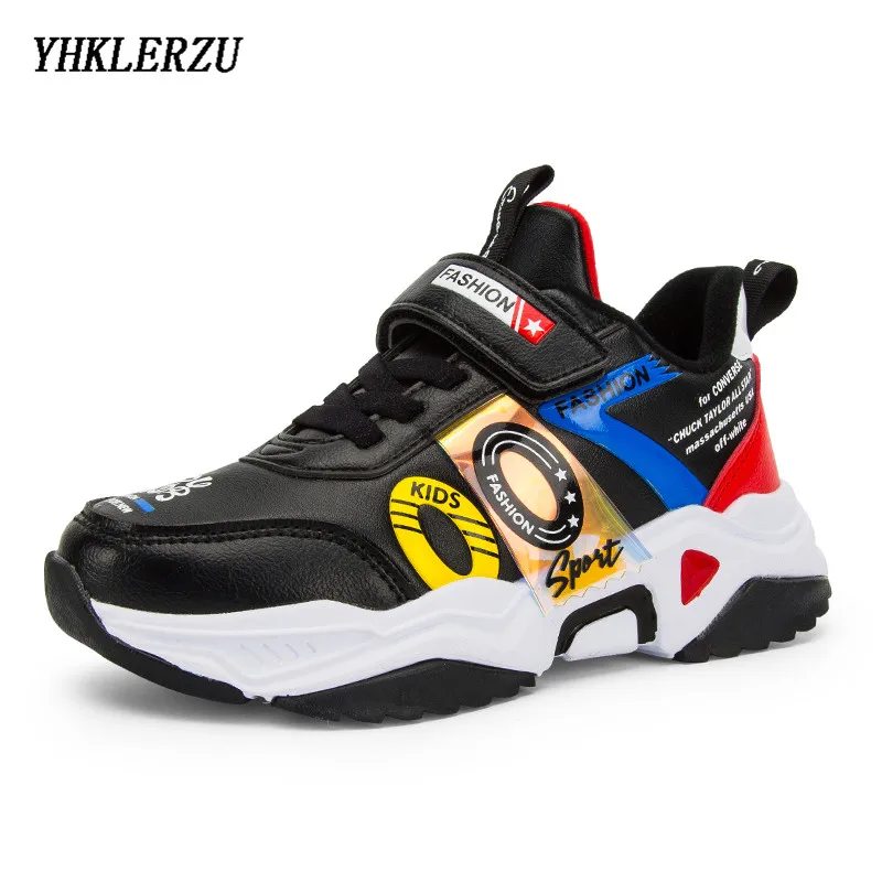 youth black tennis shoes