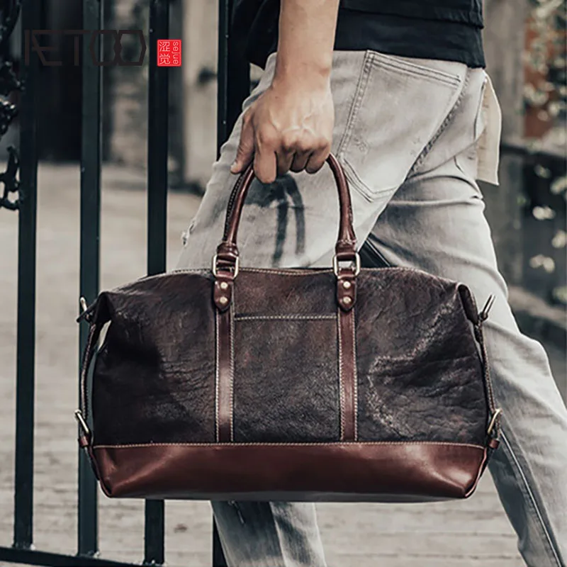 

AETOO Vintage handmade pleated men's stiletto bag, head-layer cowhide coin buckle postman bag, leather travel bag